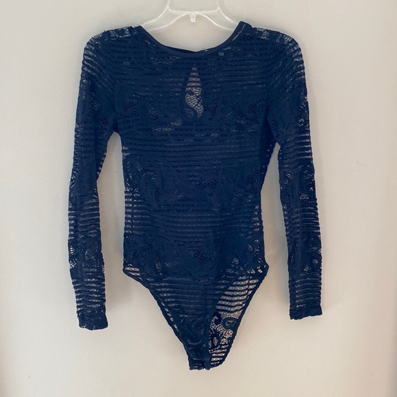 Cute Black Charlotte Russe stylish bodysuit. - Picture 1 of 3